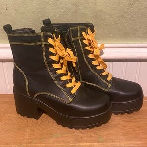 Koi black leather boots with yellow shoestring lace up heel